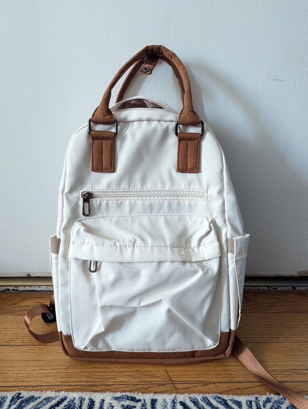 Chic White Laptop Backpack with brown accents